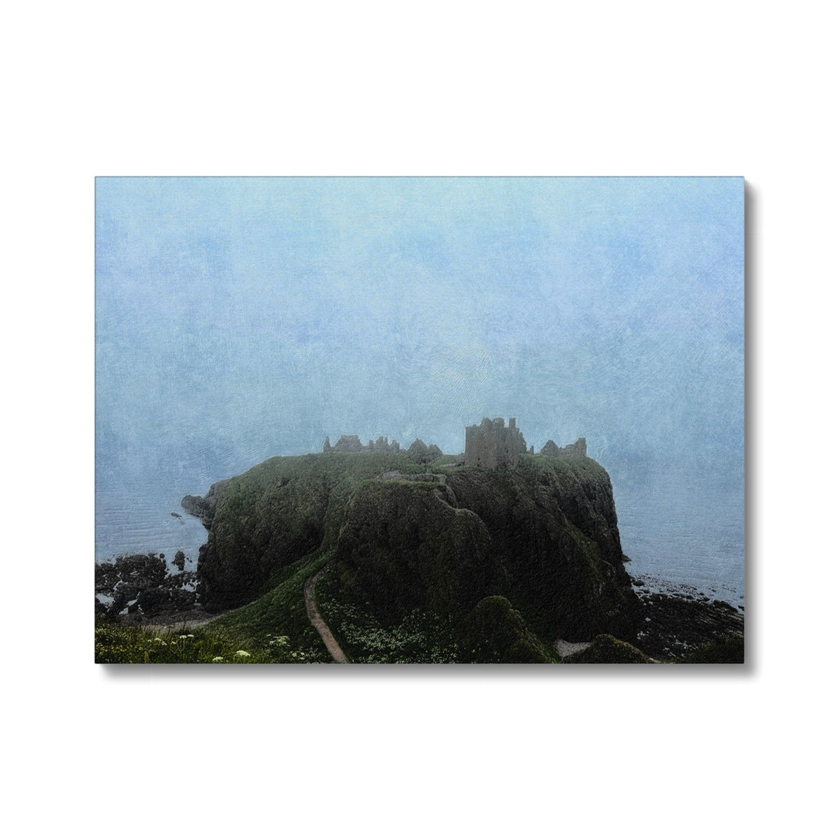 Dunnottar Castle in misty medieval stone on rocky cliffside