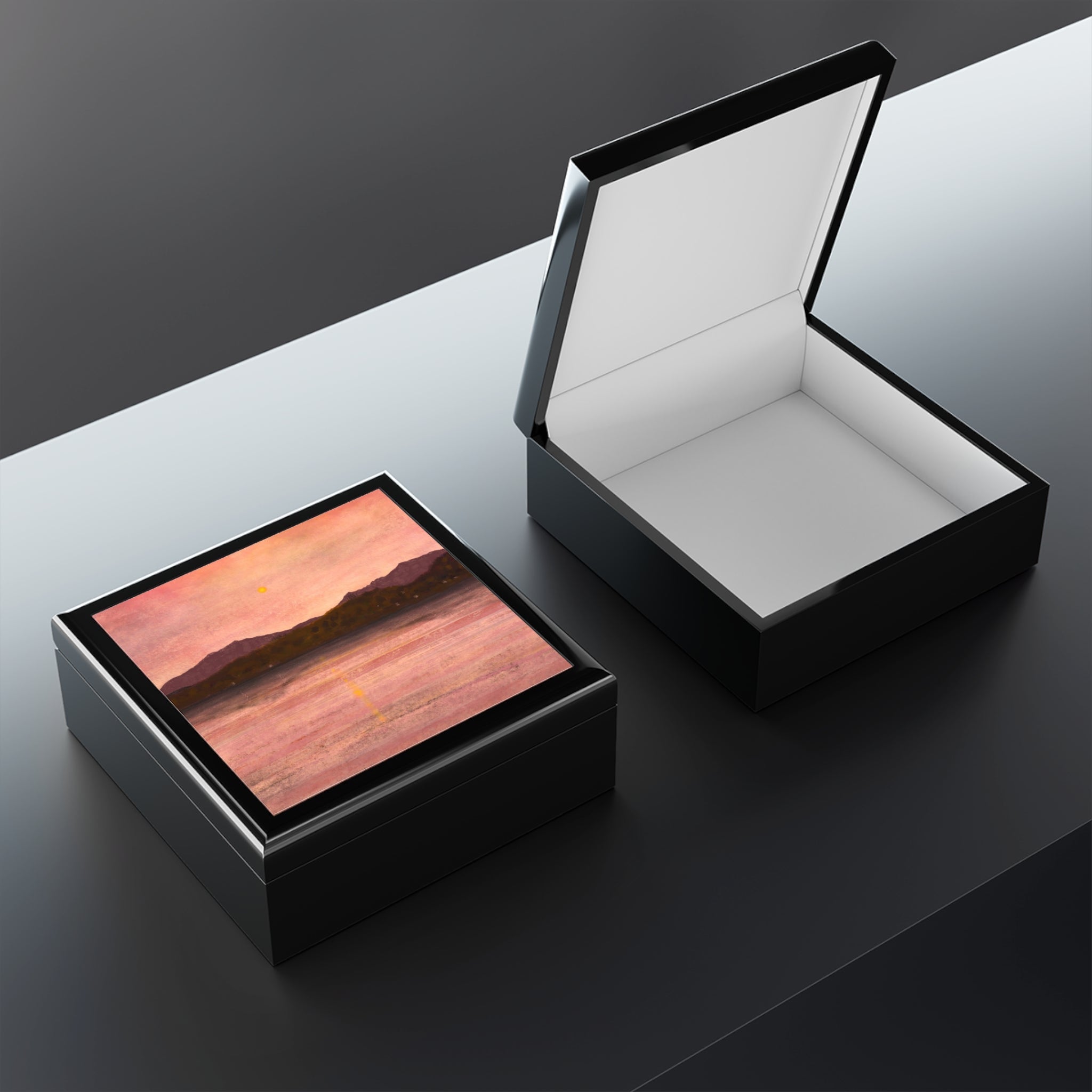 Glossy black Dusk Over Arran & Bute jewellery box with sunset lid