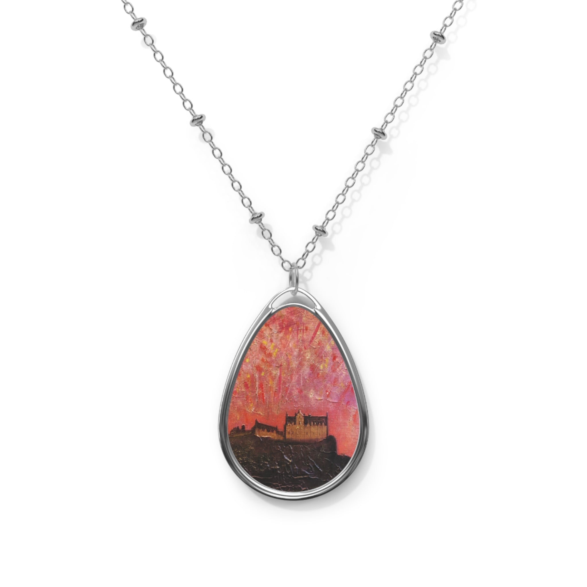 Silver teardrop pendant necklace with Edinburgh Castle fireworks in pink orange sky