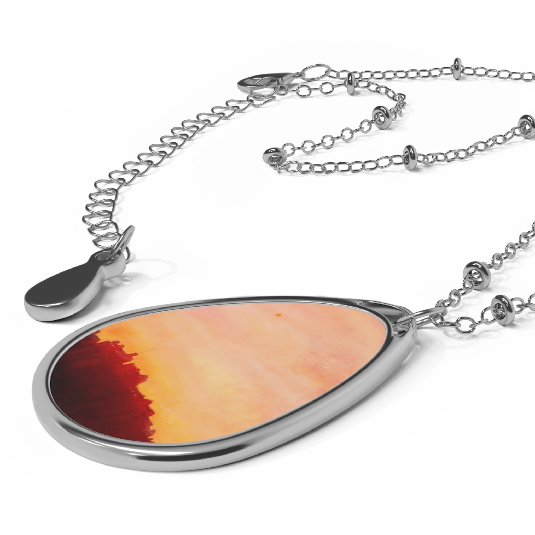 Edinburgh Castle Sunset silver teardrop pendant necklace with vibrant orange-red hues