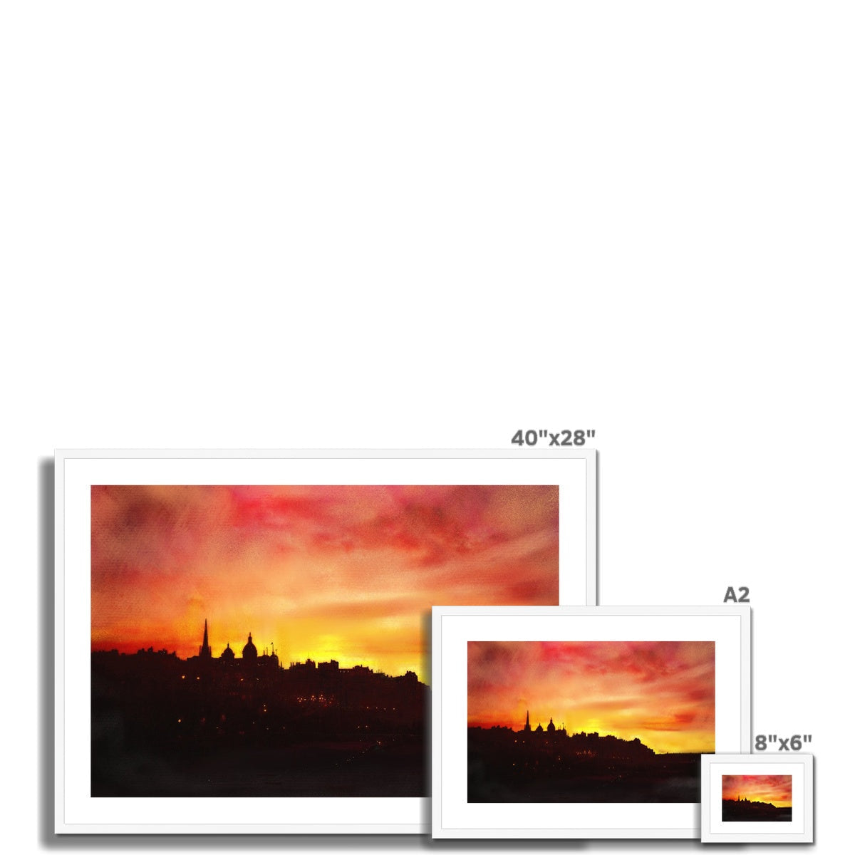 Three framed prints of a sunset cityscape from Edinburgh, ideal for wall decor