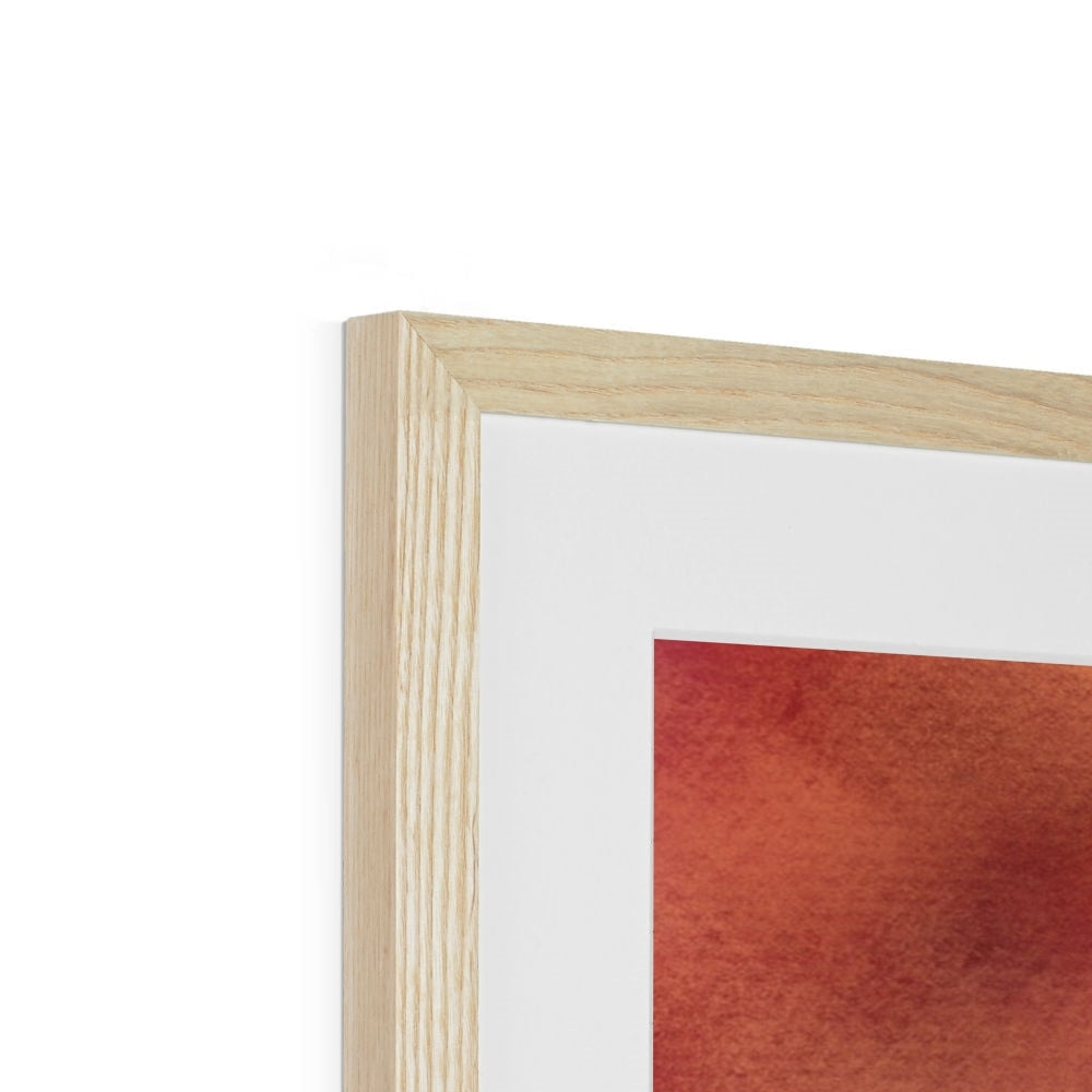 Light wood-framed Edinburgh Sunset print with white mat and red-orange artwork