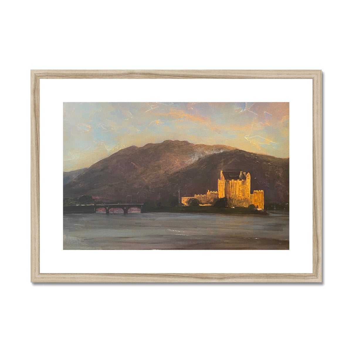 Framed oil painting of Eilean Donan Castle on a lake at sunset for wall decor