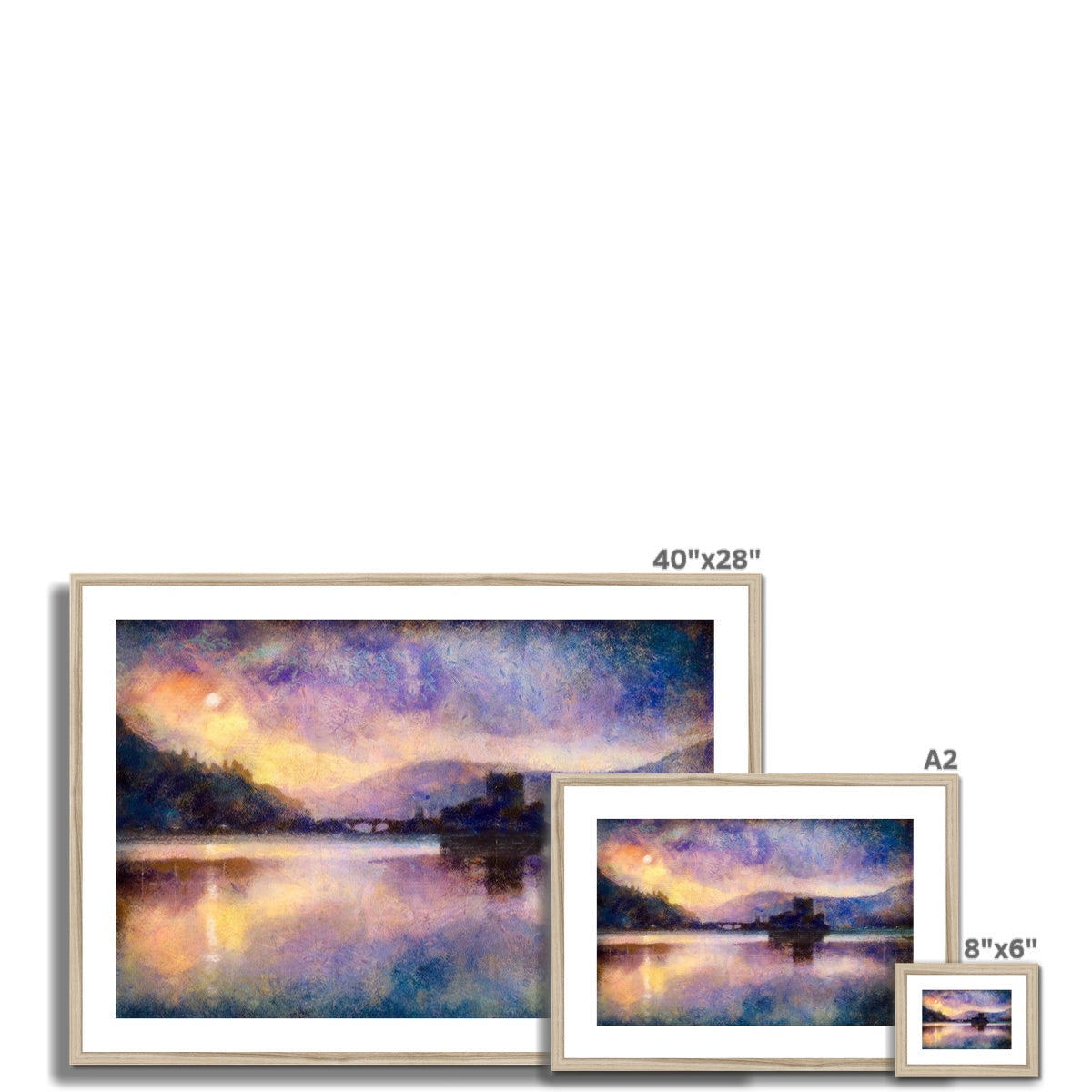 Framed landscape paintings of Eilean Donan Castle by a lake at sunset for wall decor