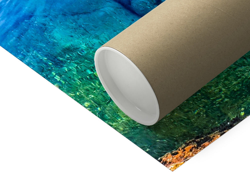 Rolled-up brown cardboard tube with white lining on Fairy Pools Isle of Skye print