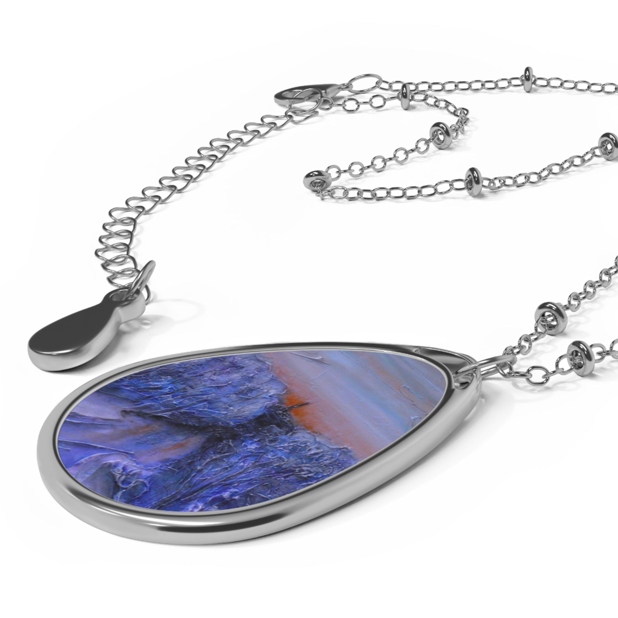 Silver teardrop pendant necklace with blue orange agate in Frozen River Kelvin design