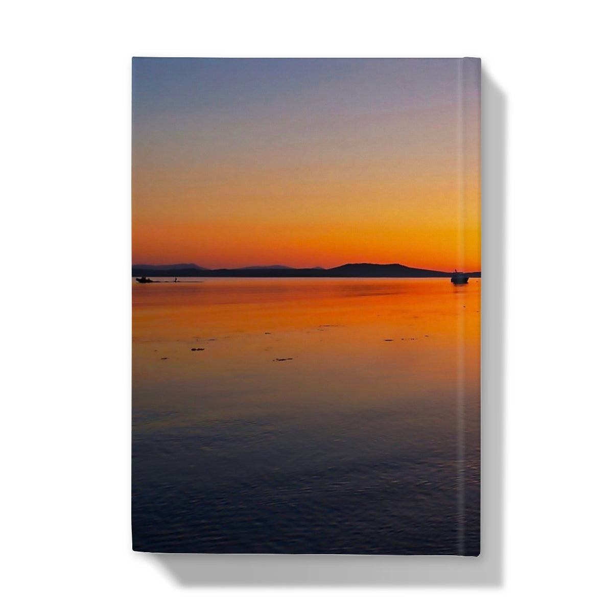 Tranquil Gigha & Jura sunset canvas print with boats on calm water