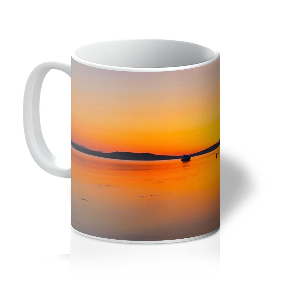 Gigha and Jura Sunset Mug in ceramic with orange yellow hues