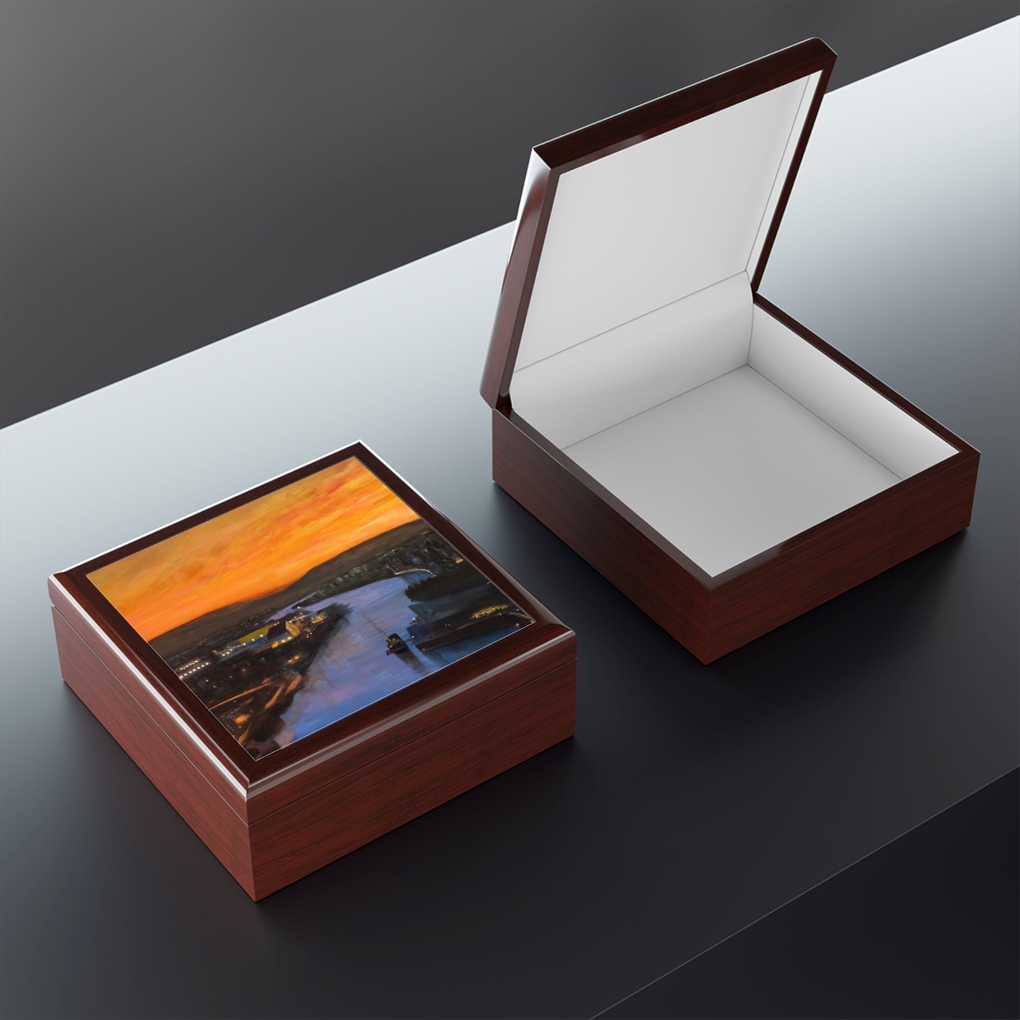 Brown wooden jewelry box with glossy sunset over Glasgow Harbour