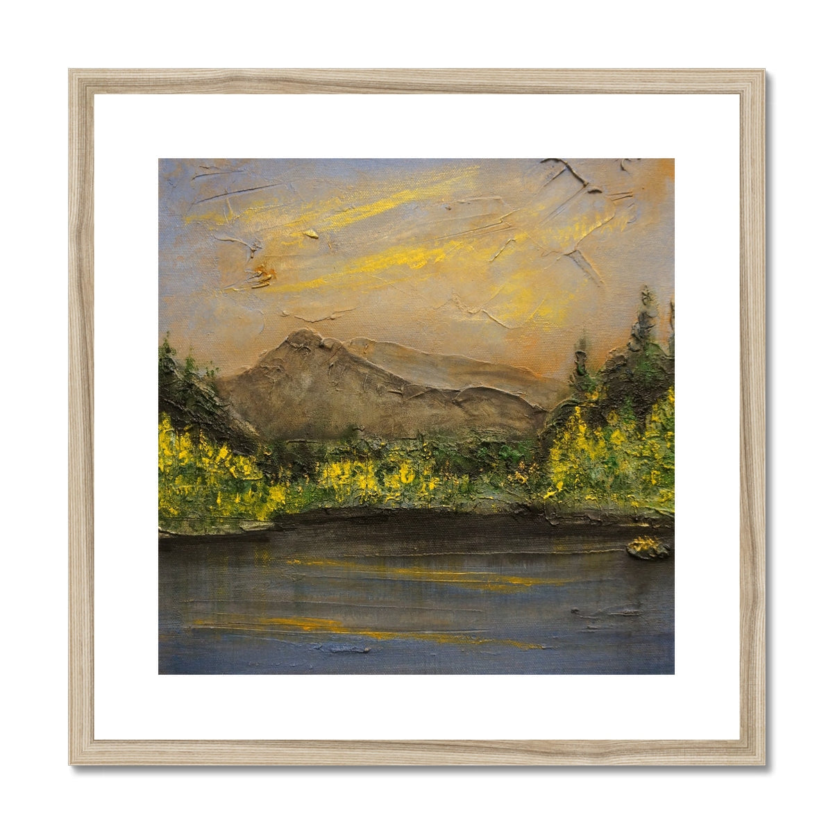 Wooden-framed Glencoe Lochan landscape print in muted earth tones