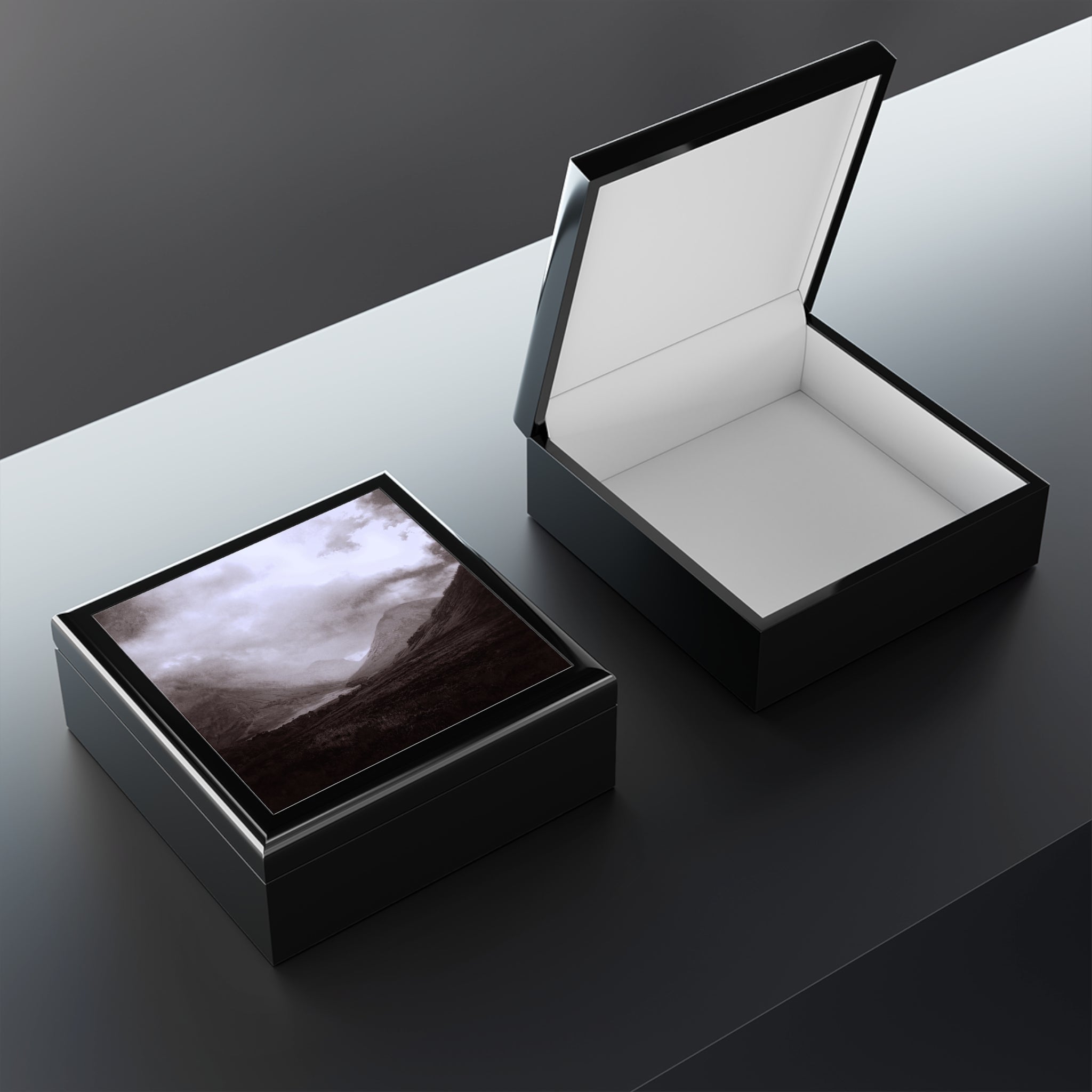 Black wooden Glencoe Mist jewelry box with landscape lid and white interior display
