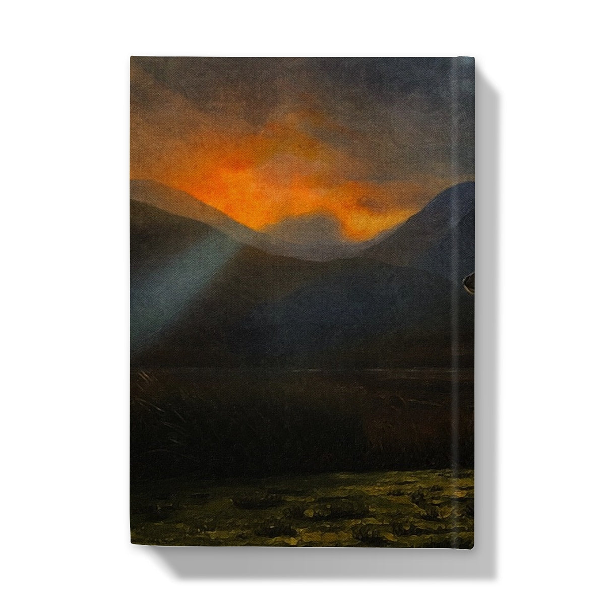 A Glencoe Sunset Stag hardcover journal with sunset mountain cover