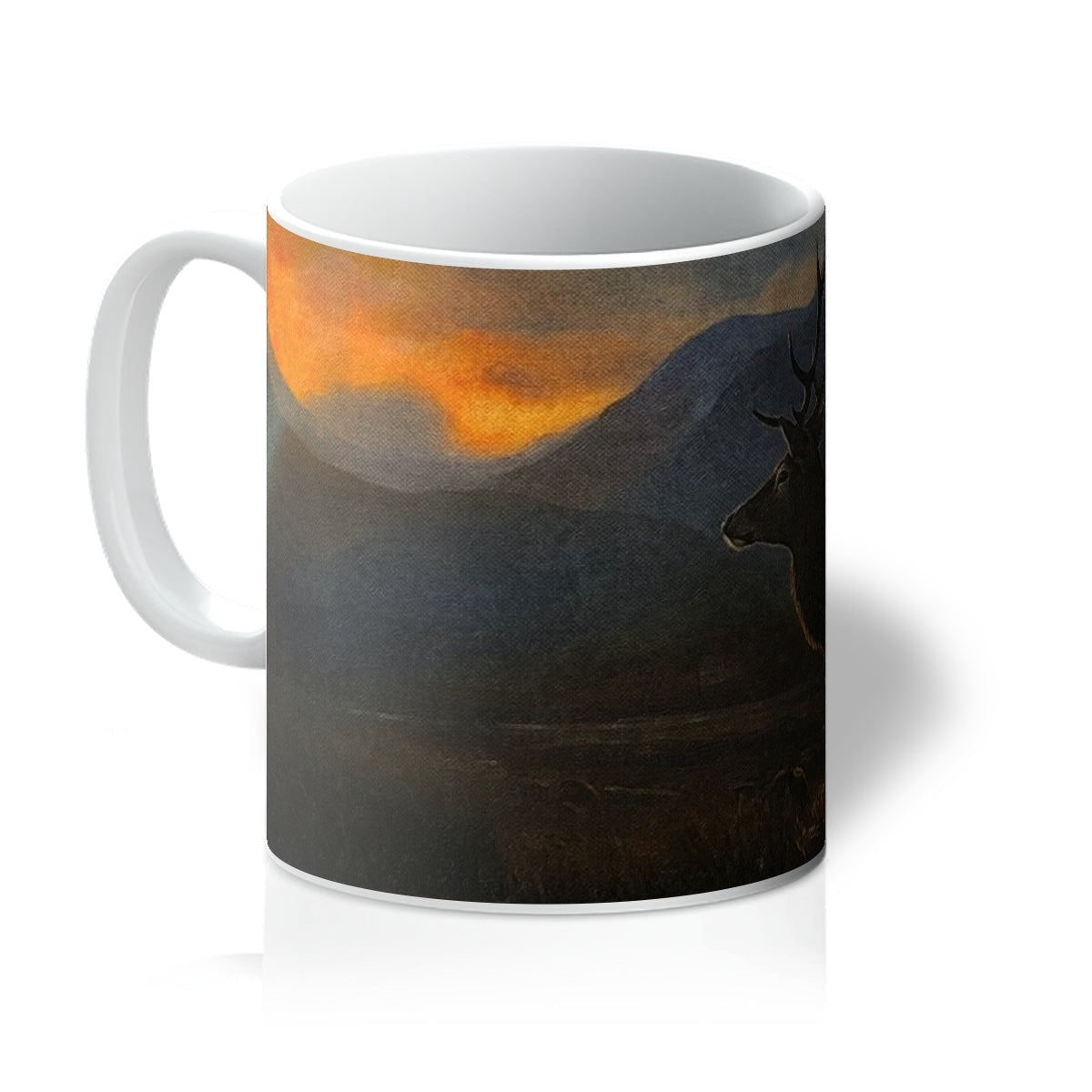 White ceramic Glencoe Sunset Stag Mug with orange sunset landscape
