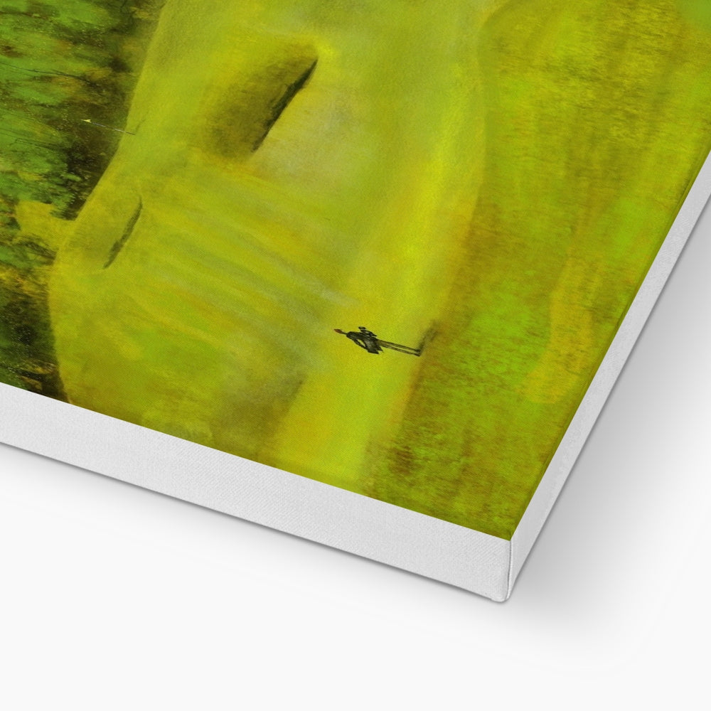 A canvas print with abstract green and yellow brushstrokes depicting a figure.