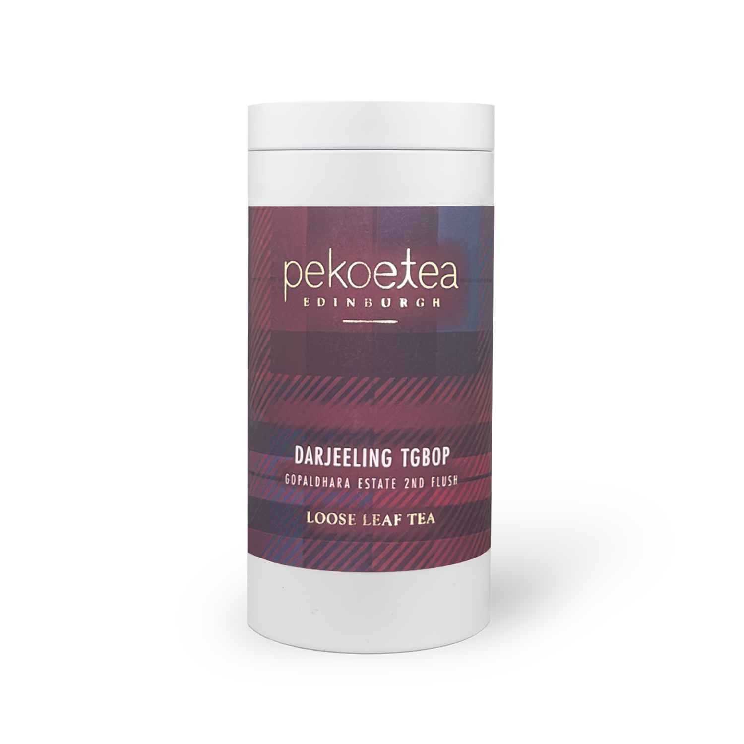 Cylindrical white container of Gopaldhara TGBOP Second Flush Darjeeling tea with plaid label