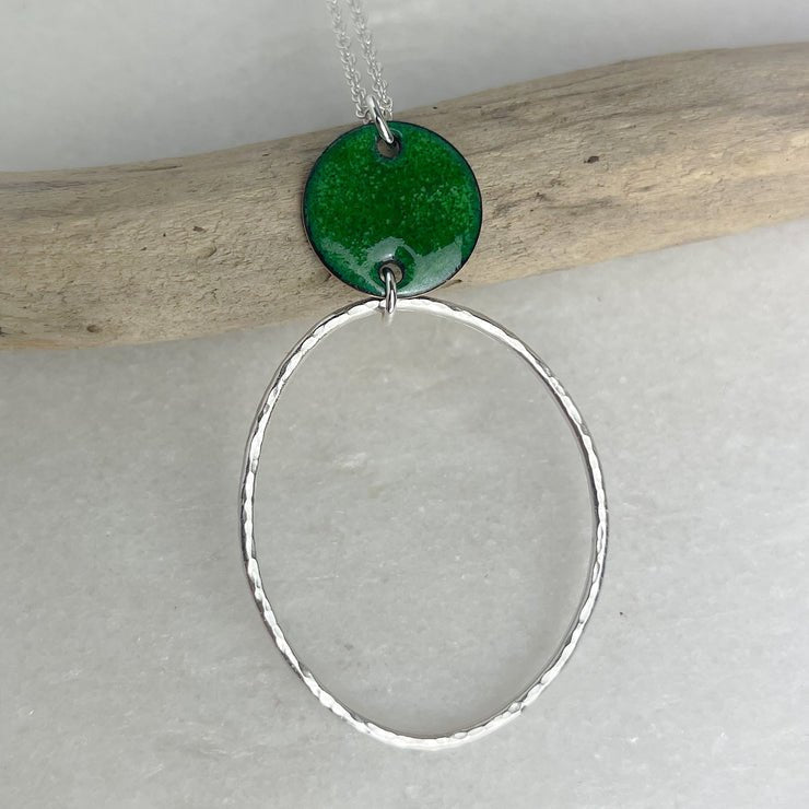 Grass green beaten oval hoop necklace in silver with enamel disc by Lindsay McDowall Jewellery