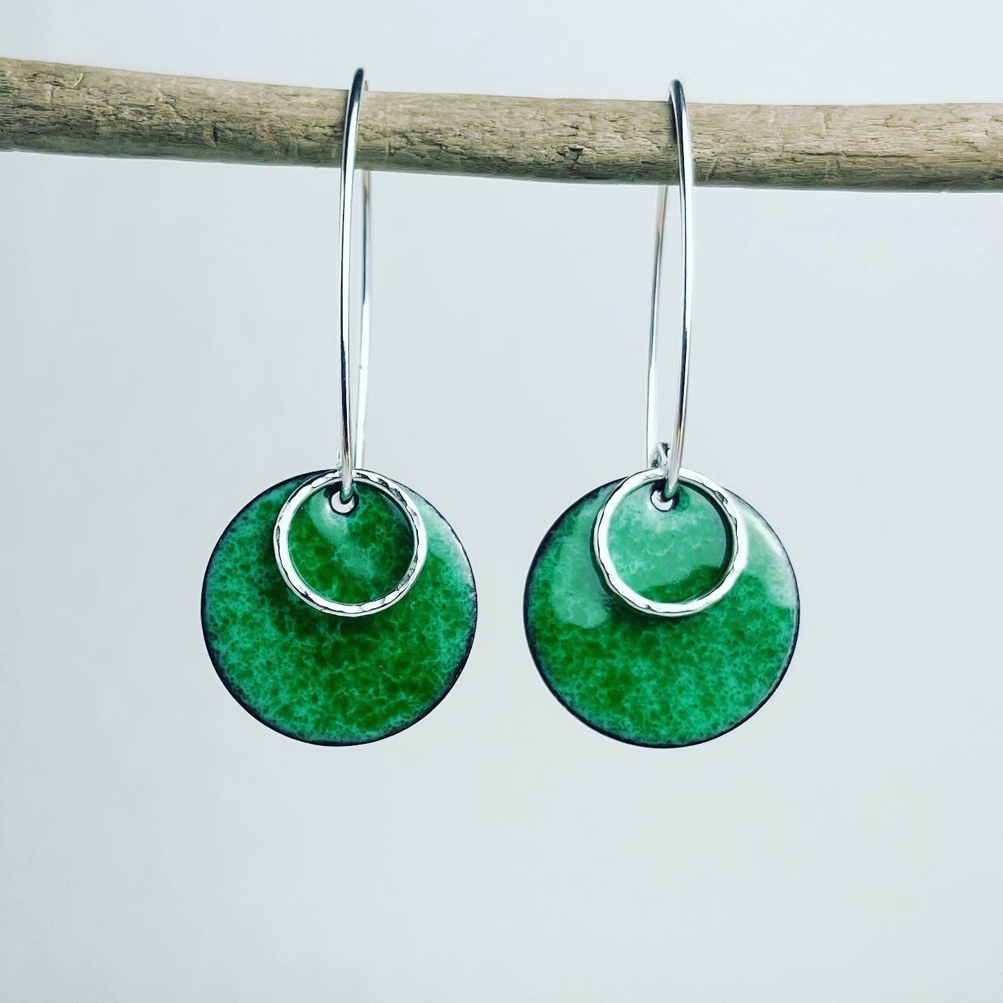Grass green enamel disc earrings with silver hoops by Lindsay Mcdowall Jewellery