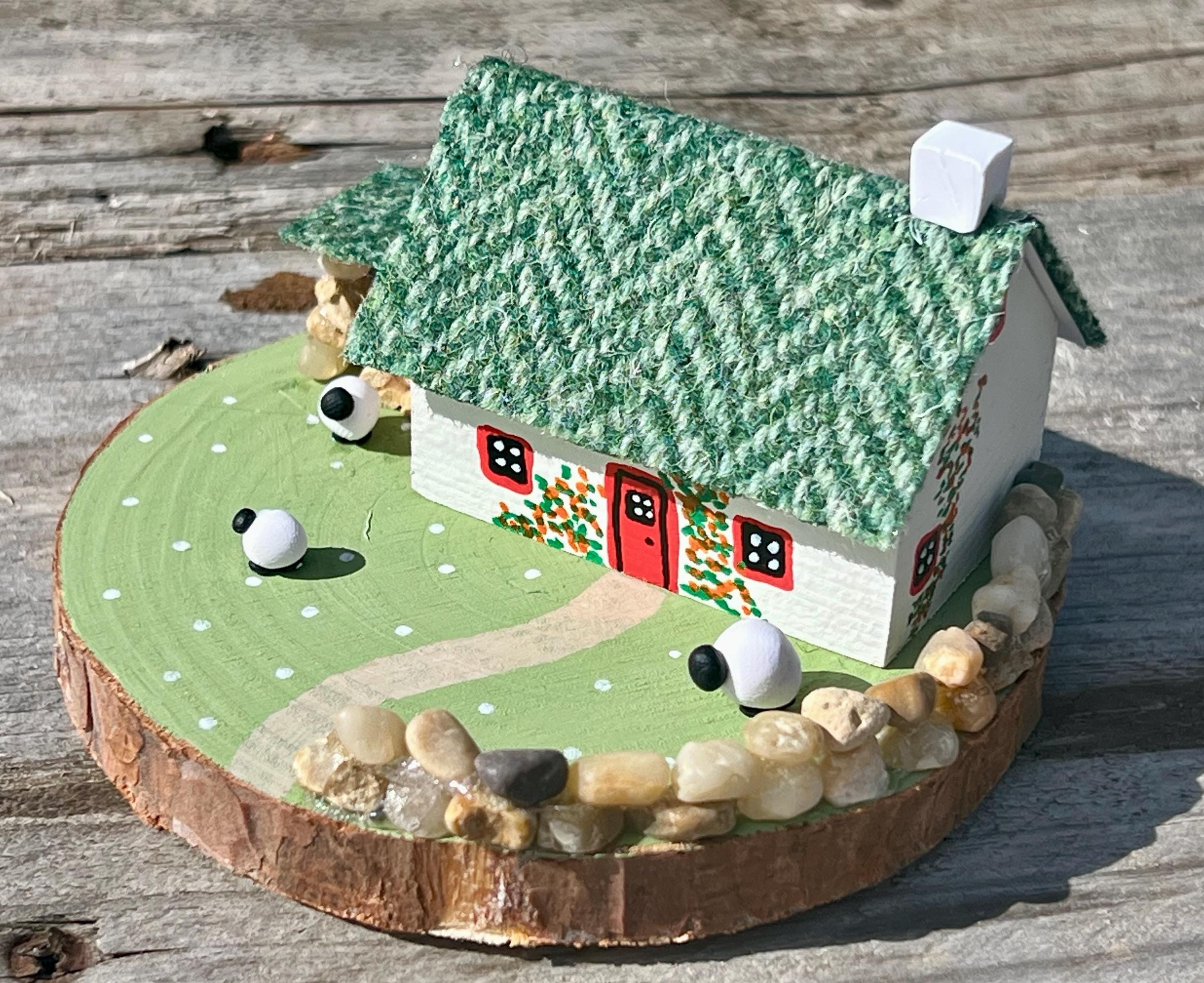 Handcrafted miniature Irish cottage diorama with sheep figurines for Green Harris Tweed Scottish Bothy