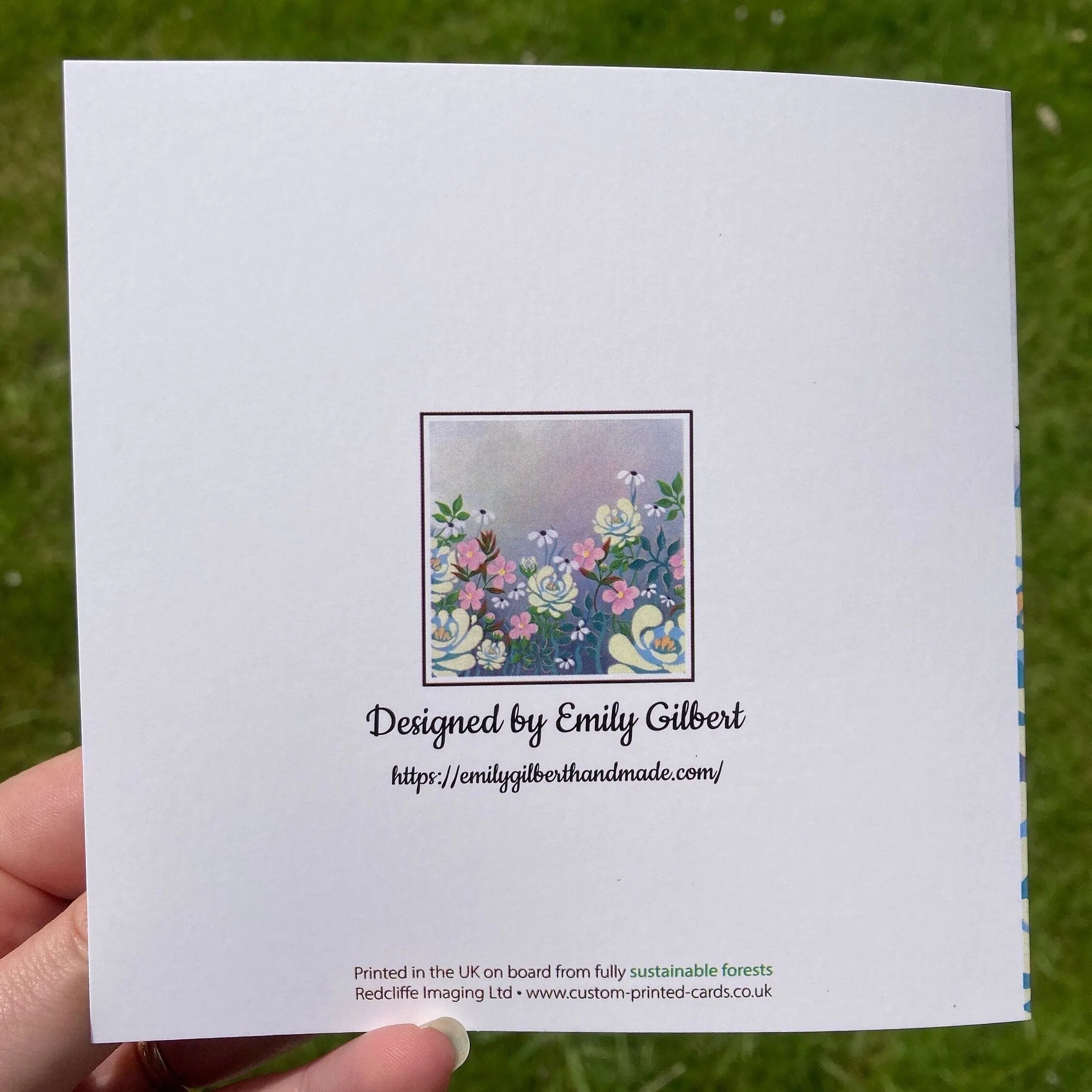 White greeting card with hand-drawn ivory pink roses and daisies floral illustration