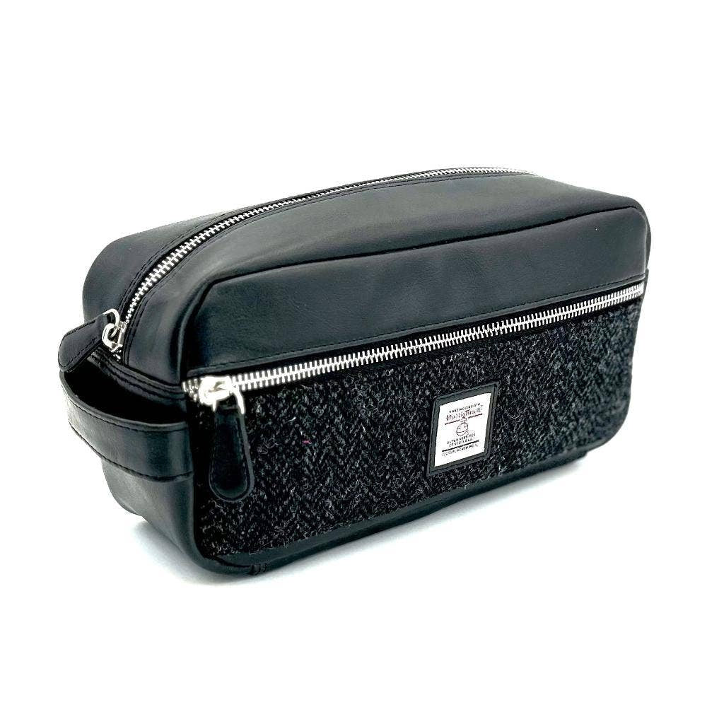 Charcoal Harris Tweed toiletry bag in black leather with silver zippers