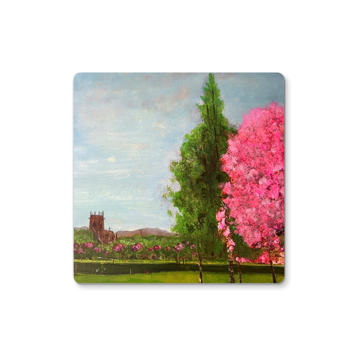 Harrison Park Edinburgh square coaster with pink blossoms, green trees, hills, blue sky