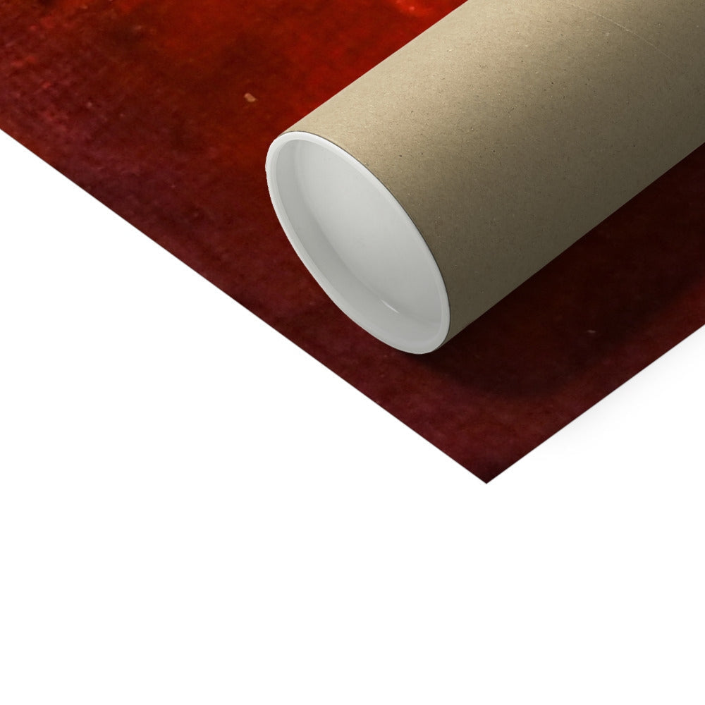 Cream-colored cylindrical tube of Hearts Artist Proof Collector Print on red velvet