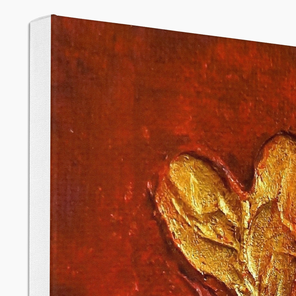 Gold leaf hearts art on red canvas wall hanging