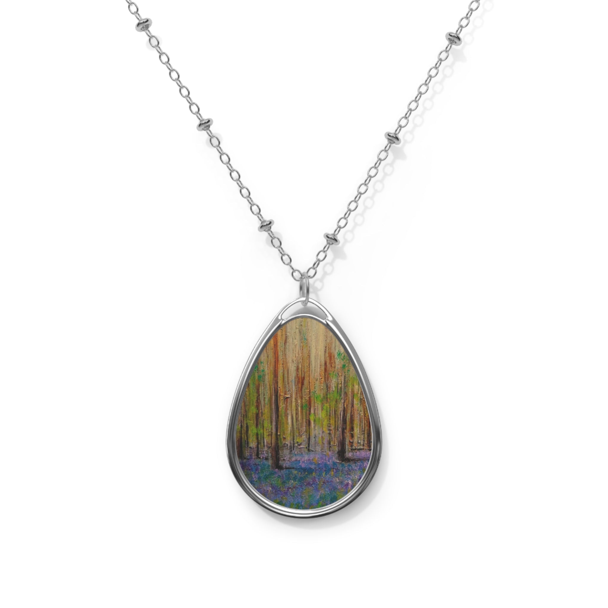Silver chain necklace with oval pendant showcasing a painted Highland forest scene