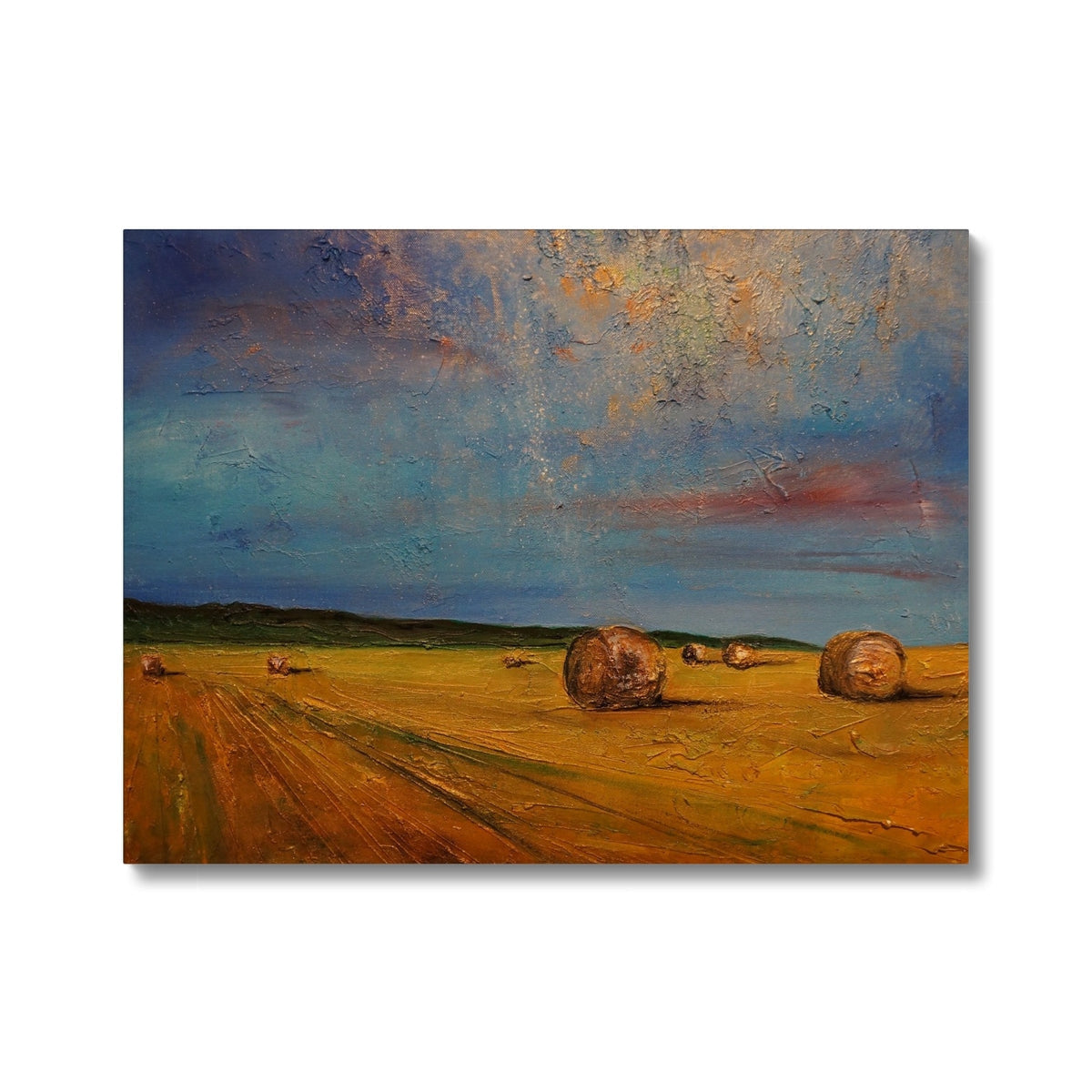 Golden hay bale canvas print with textured sunset hues
