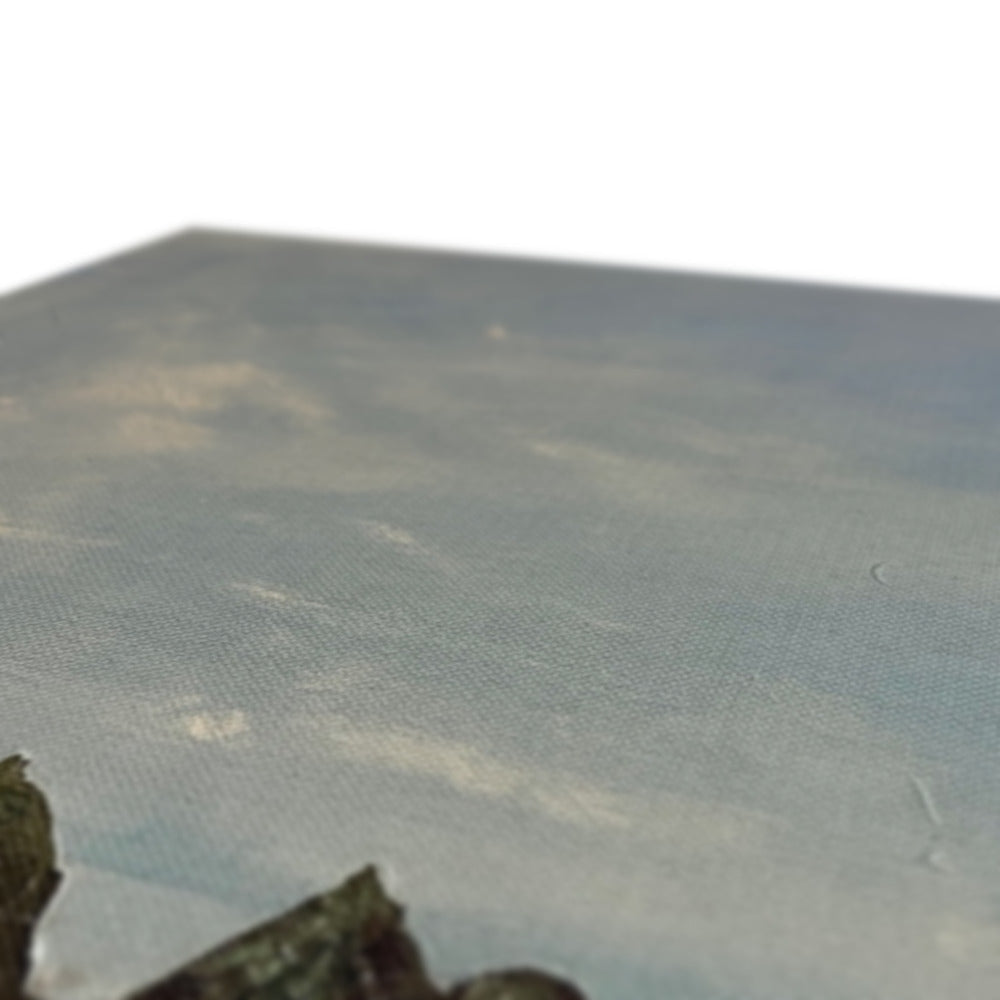 Blue stone coaster with textured surface on Holywell Beach Cornwall canvas