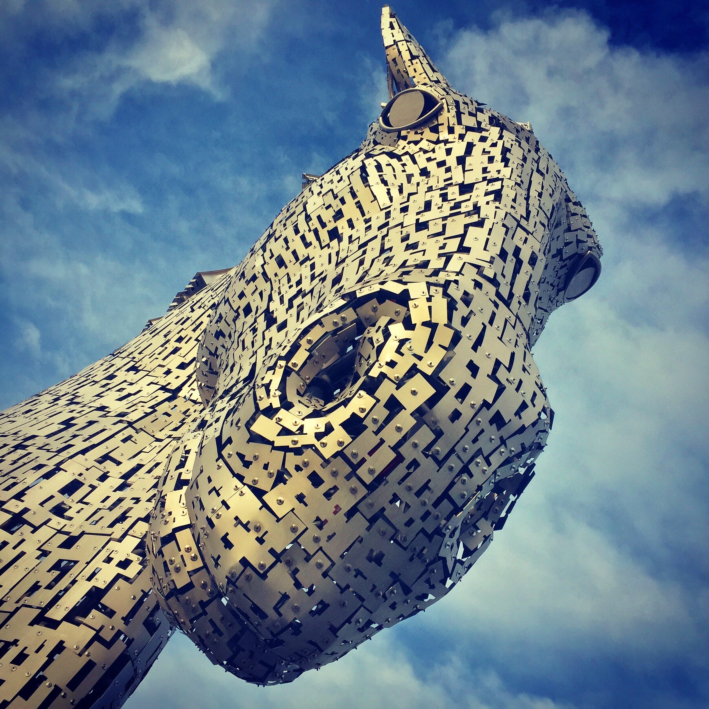 Metallic horse head sculpture made of small rectangular plates from Kelpie Scotland In Your Pocket