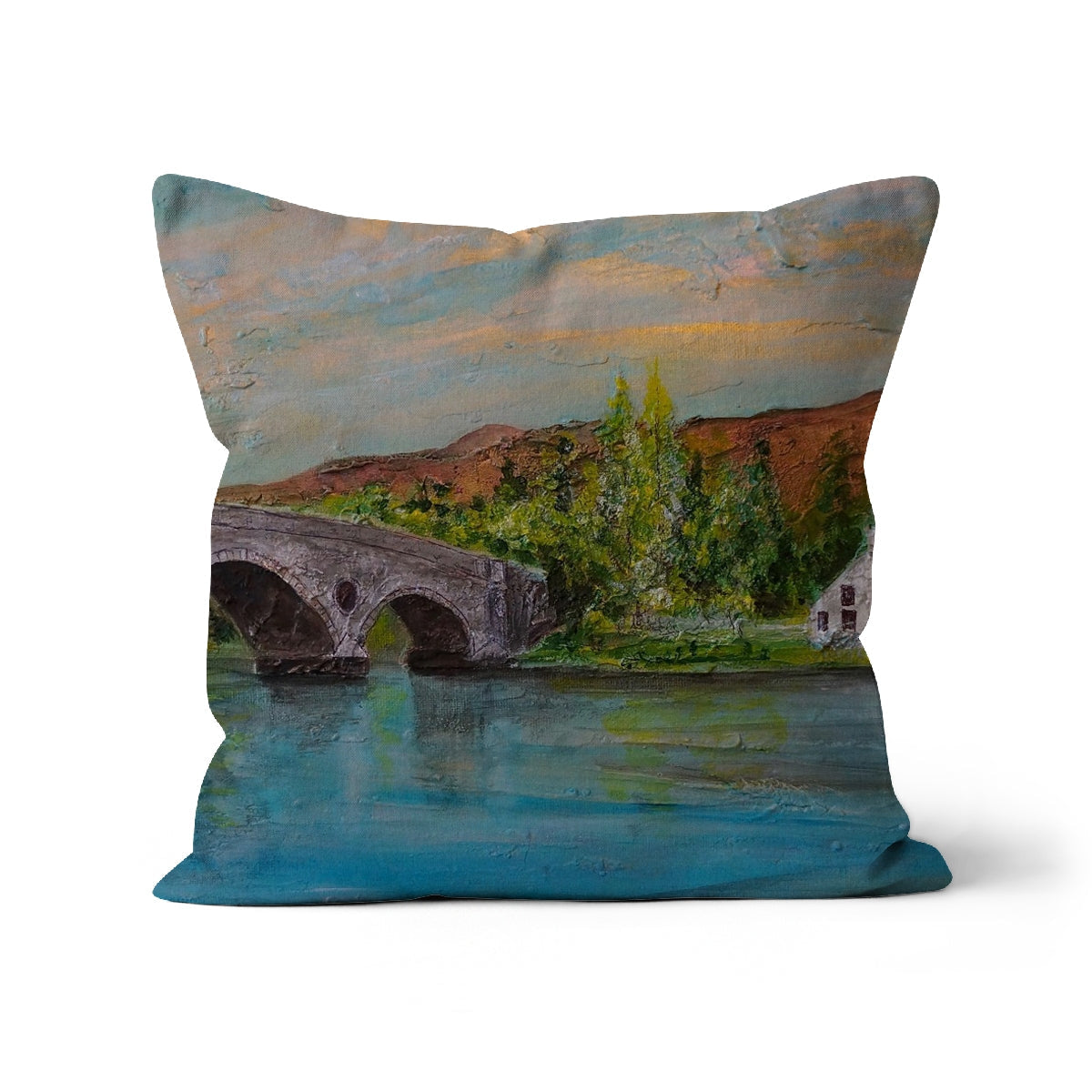 Kenmore Bridge II Cushion with stone bridge, trees on blue watercolor background