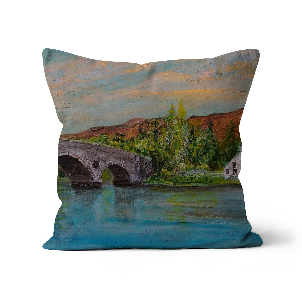 Kenmore Bridge II cushion with stone bridge, blue water, green trees design