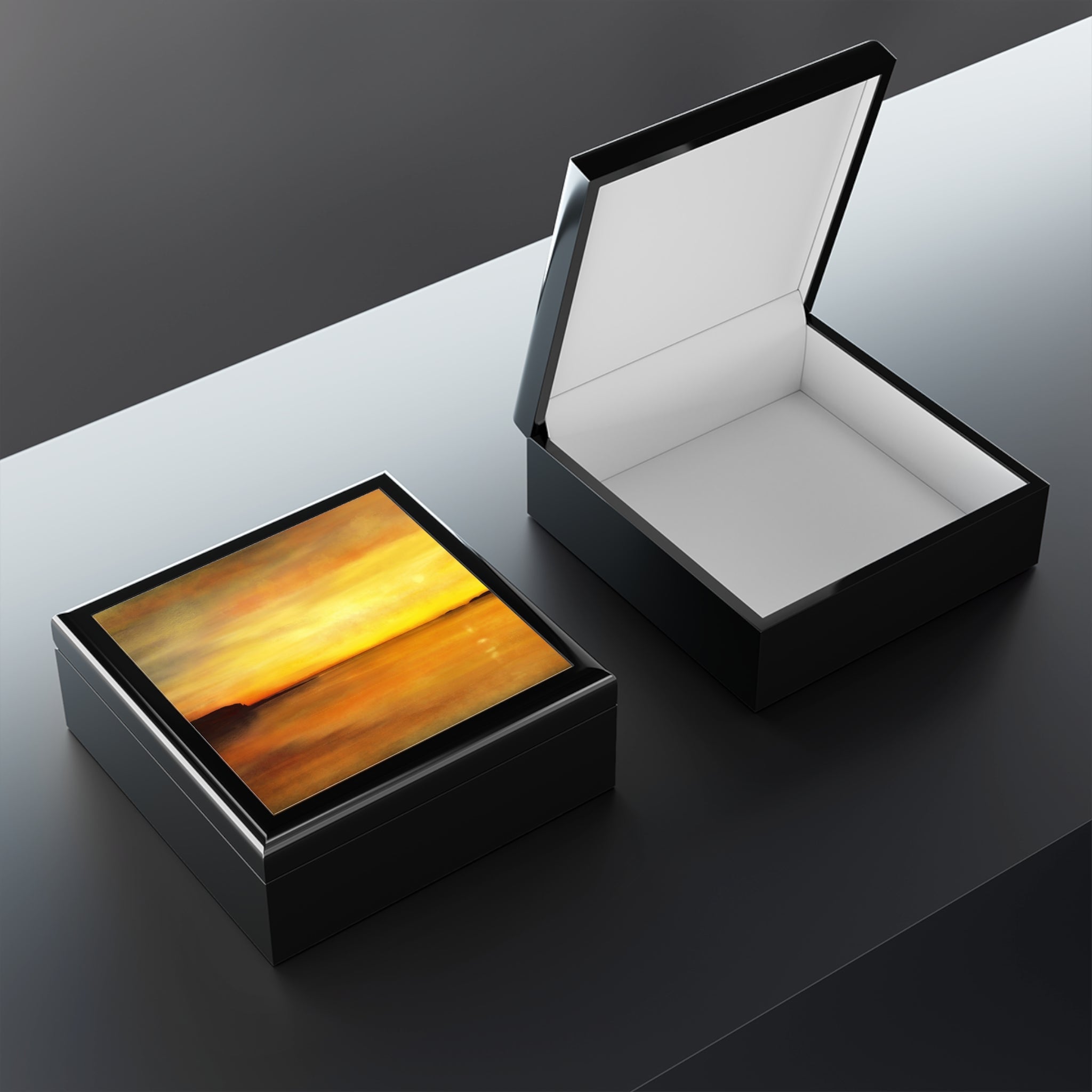 Kings Cave Sunset Arran jewelry box with glossy black square and vibrant sunset print