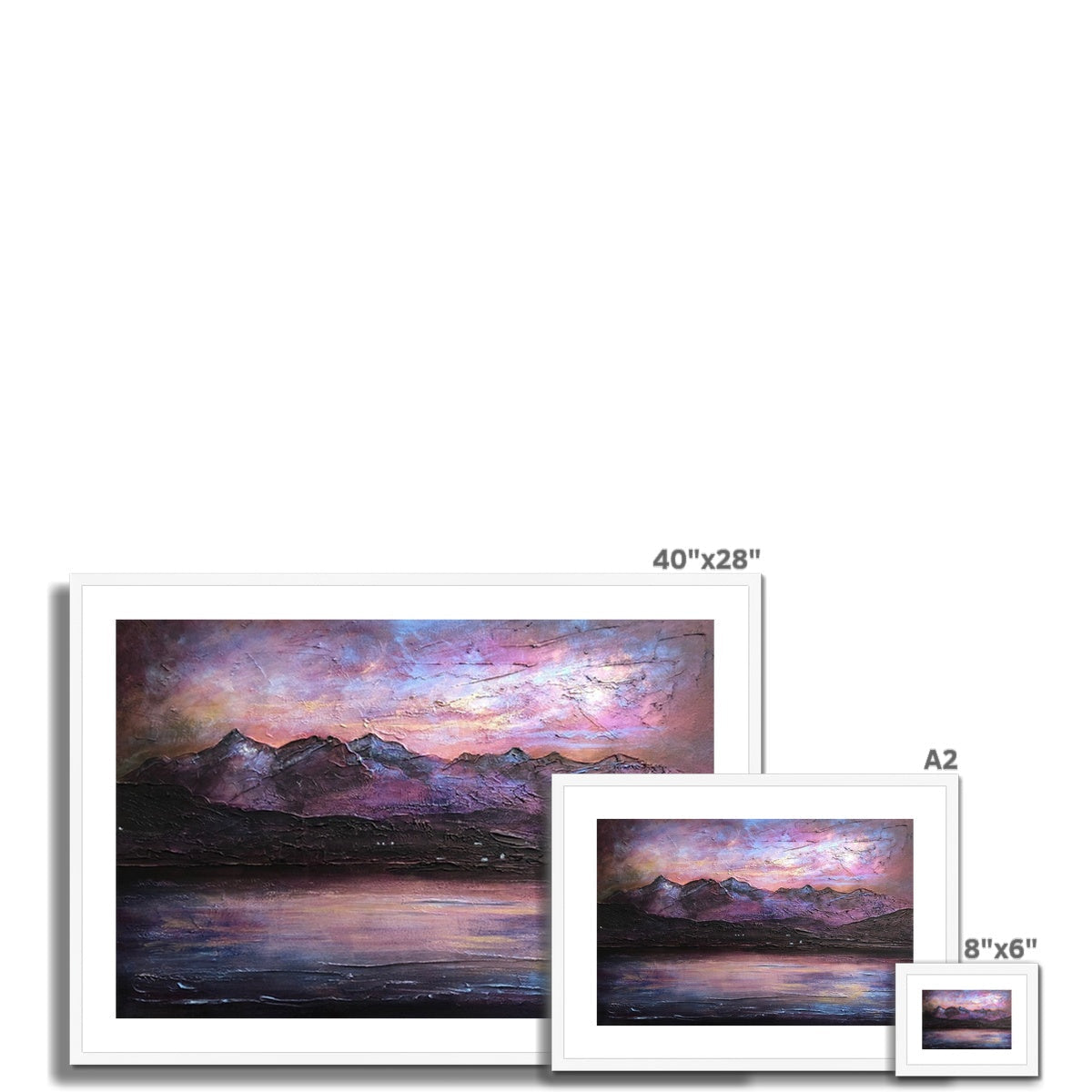 Set of three framed landscape paintings of mountains at sunset over water with vibrant sky