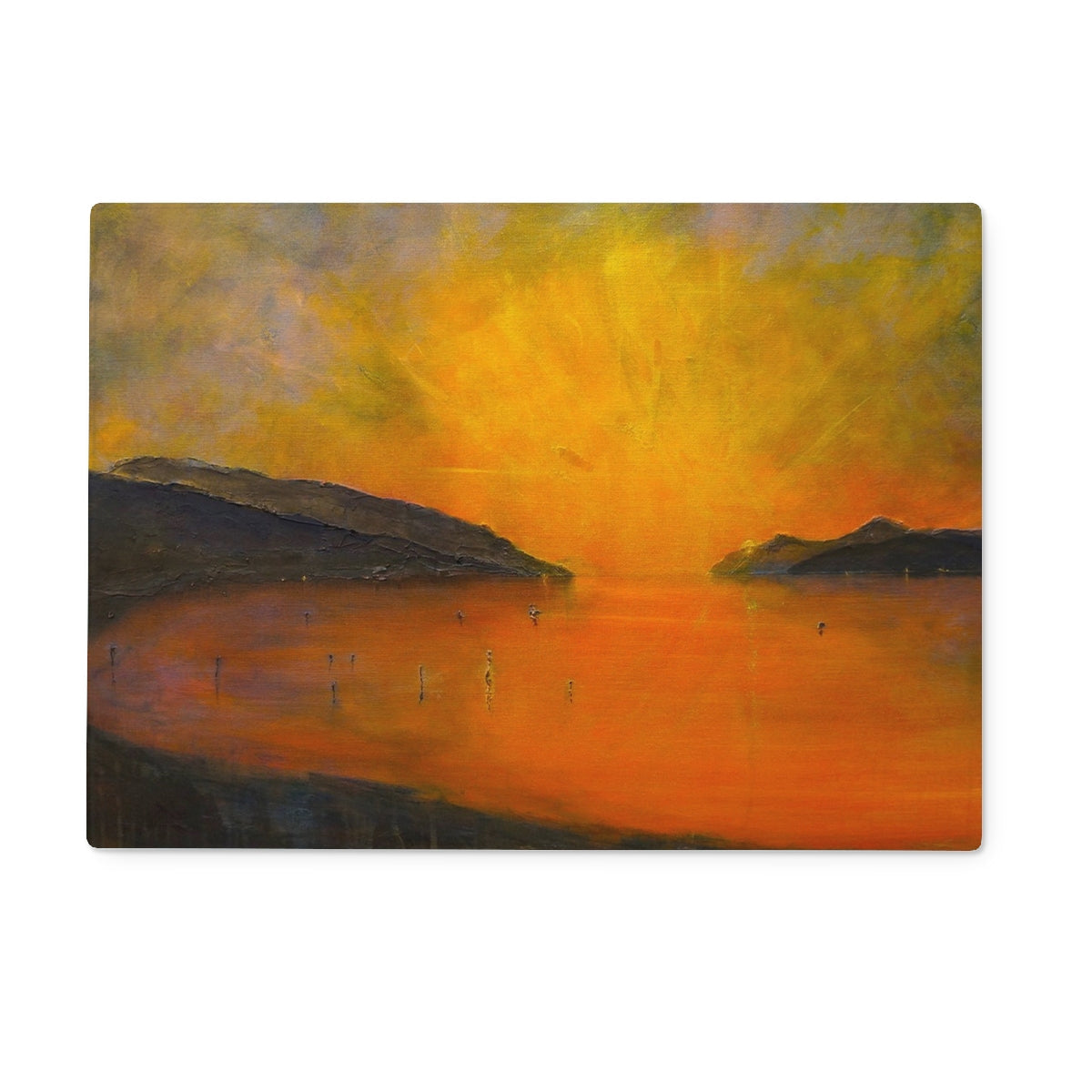 Vibrant orange yellow Loch Ness sunset on glass chopping board
