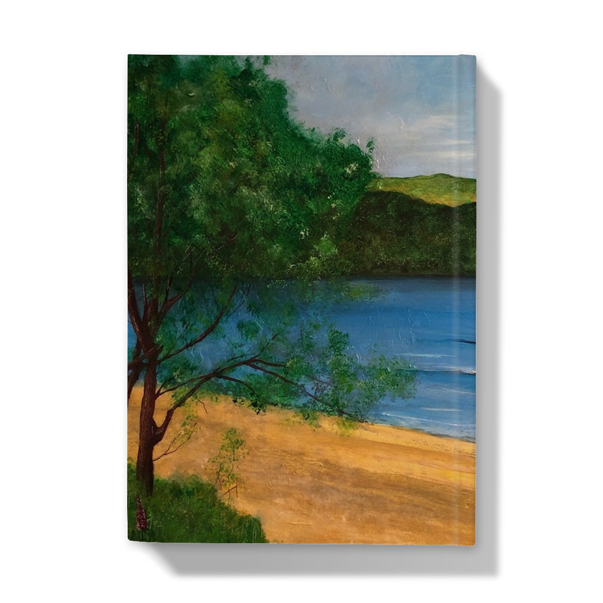 Beach scene canvas print with sandy shore, calm blue water, green trees, and rolling hills for the Loch Rannoch Hardback Journal