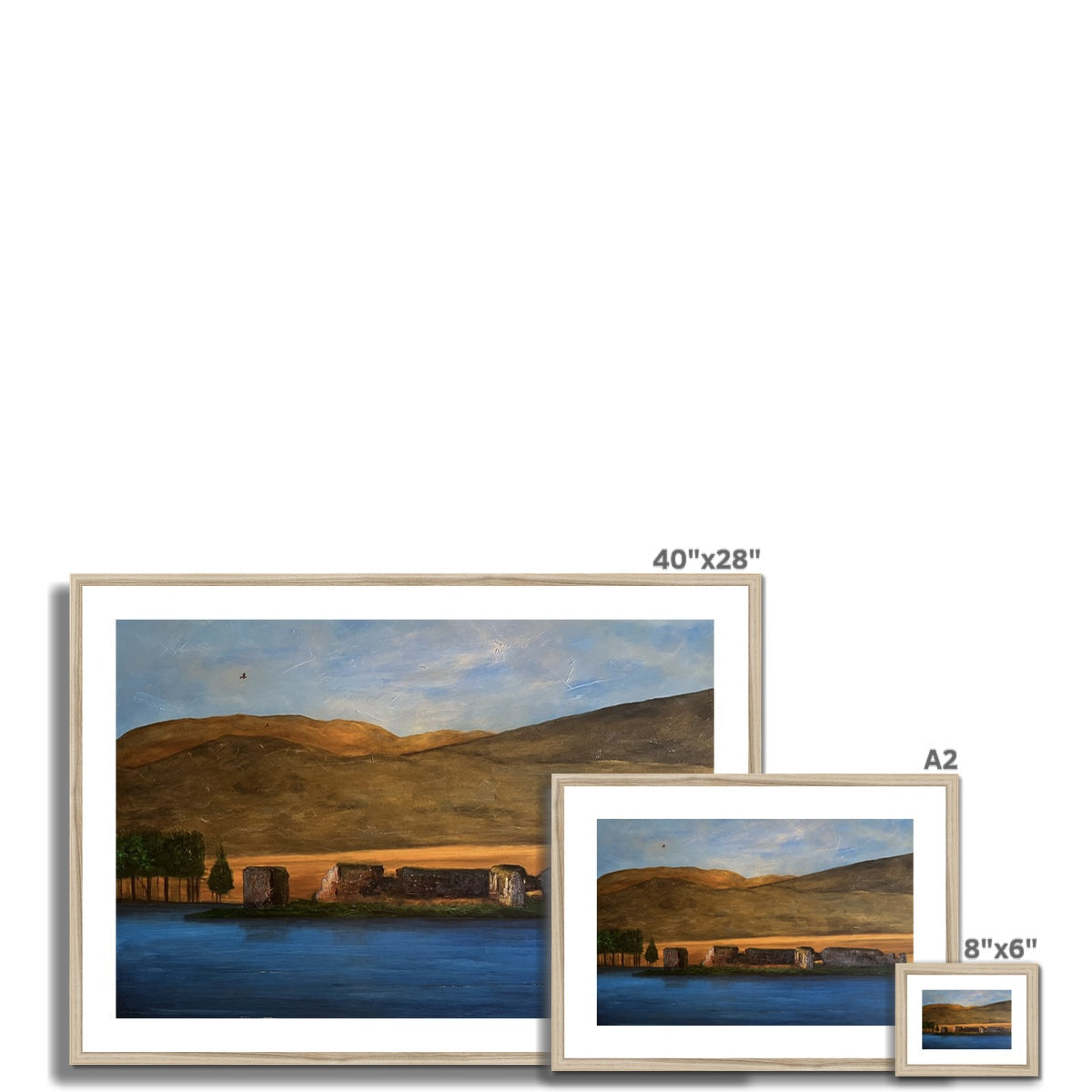 Three framed landscape paintings of varying sizes displayed with the Lochindorb Castle print