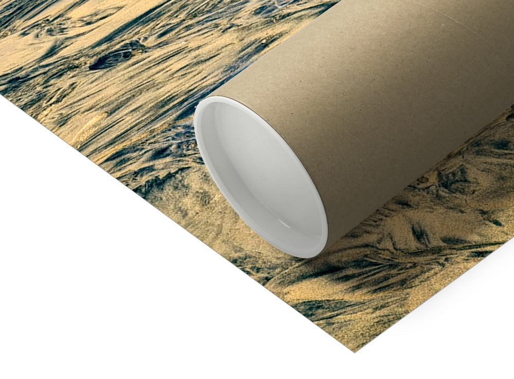 Luskentyre in Winter print: rolled brown cardboard tube with white lining on sand dunes surface