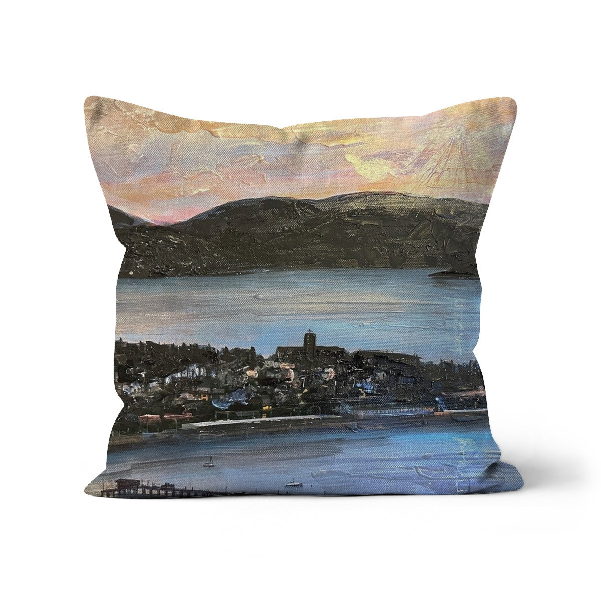 From Lyle Hill Cushion with coastal landscape in muted blues, greens, sunset sky