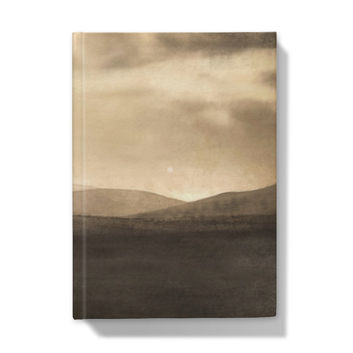 Sepia-toned moonlit croft landscape on journal