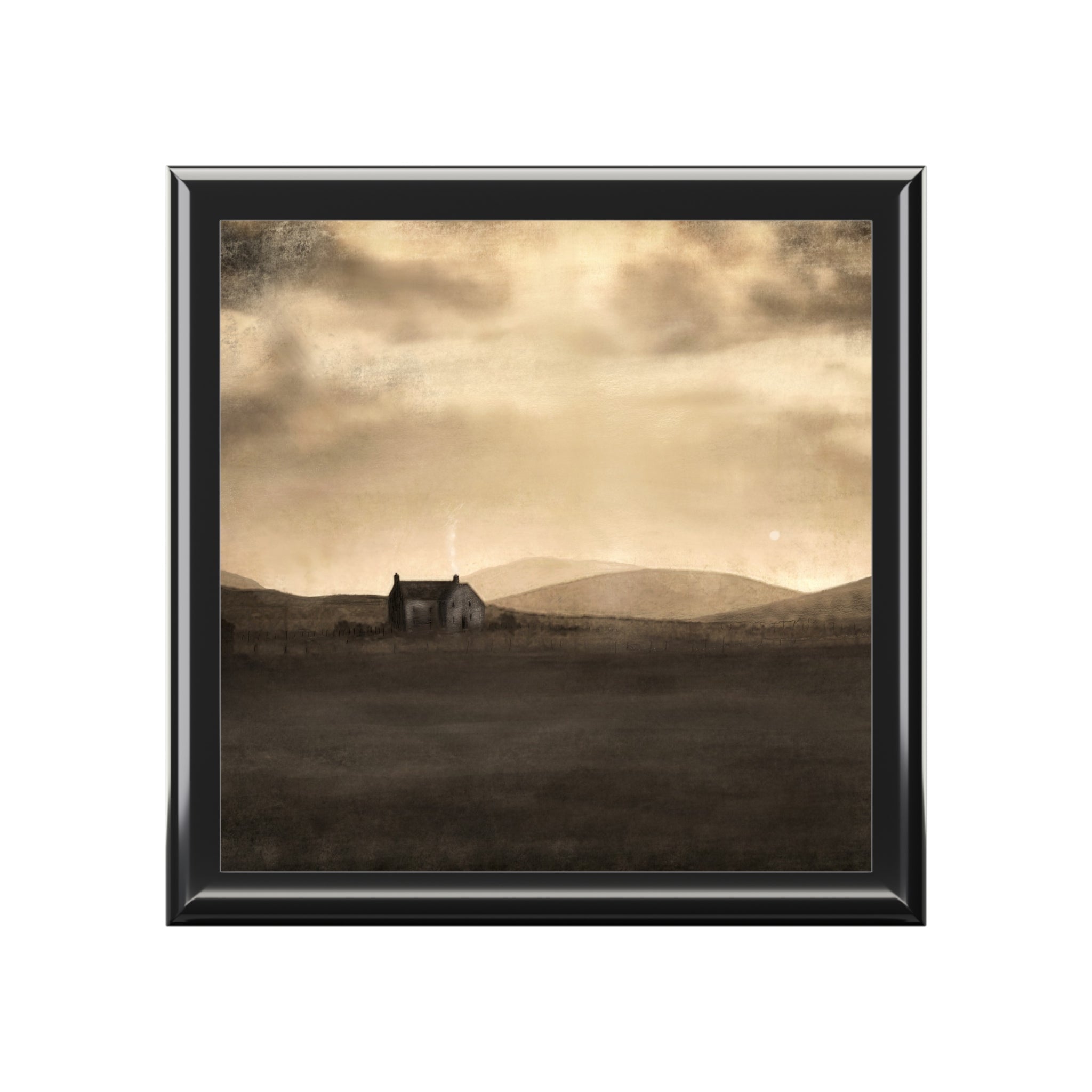 Brown house painting with black frame in A Moonlit Croft jewellery box