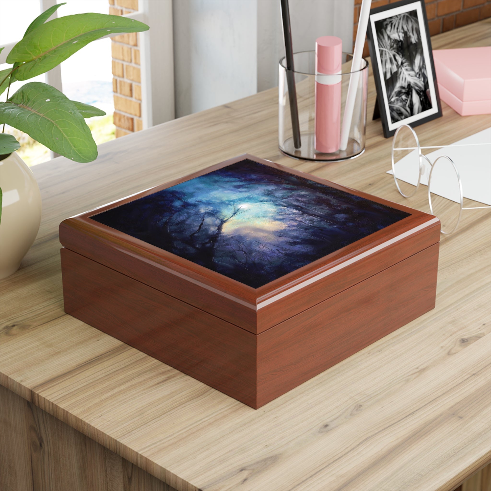 Wooden keepsake box featuring a dark ethereal tree and moon scene on its lid