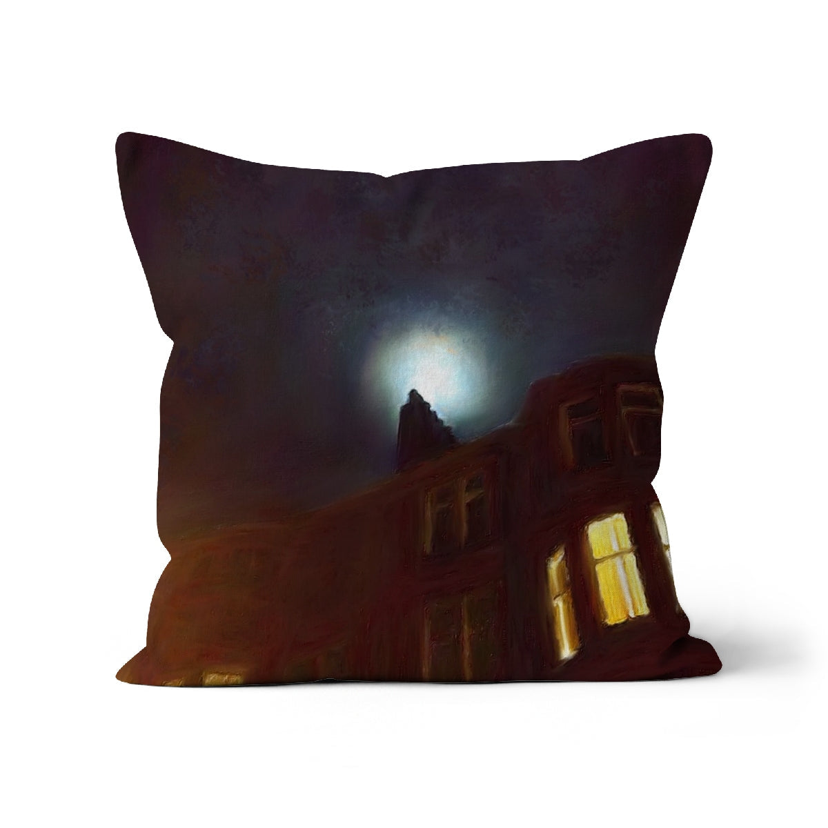 Dark-colored decorative pillow featuring a spooky house under a full moon design
