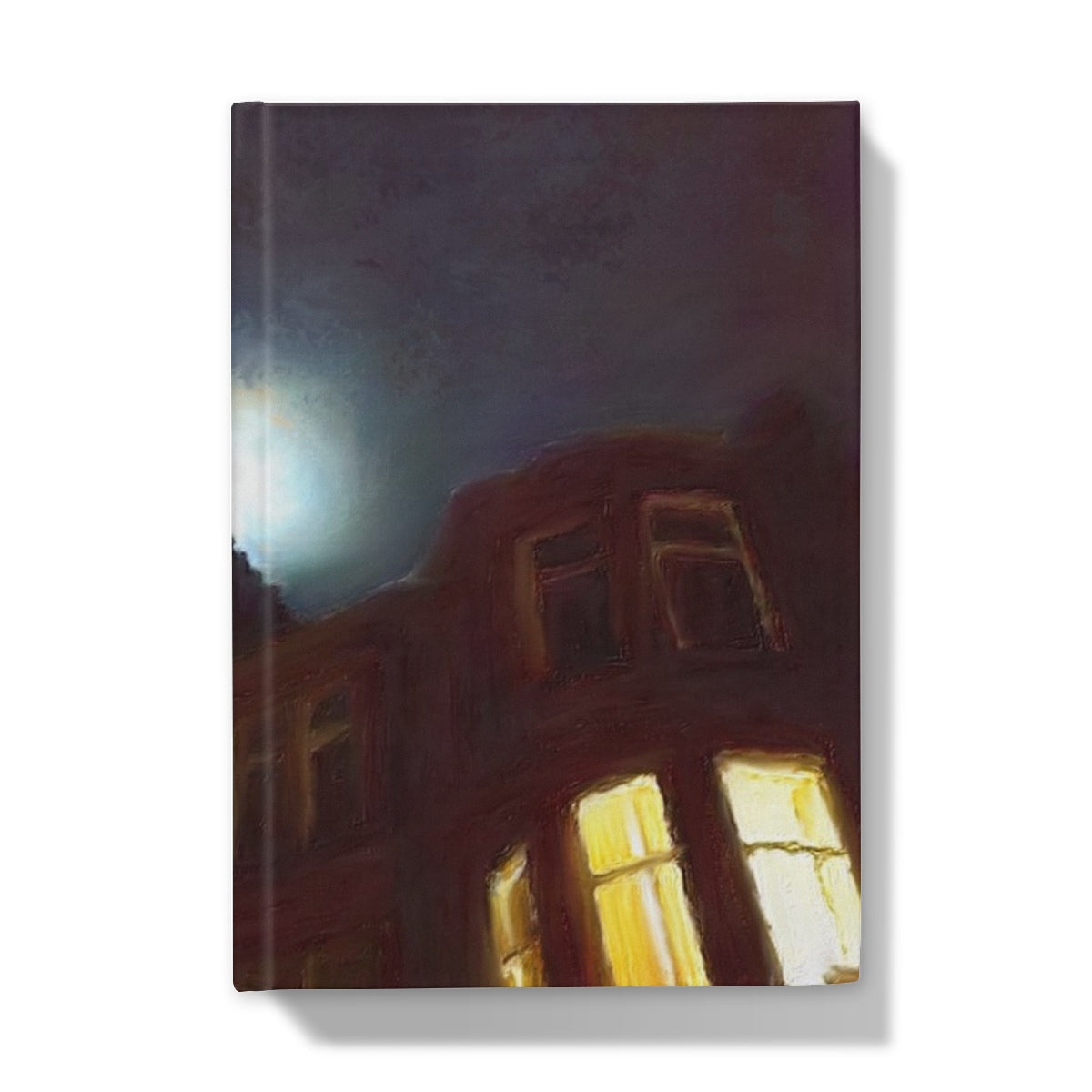 Hardcover journal with a night scene painting of a building and glowing windows