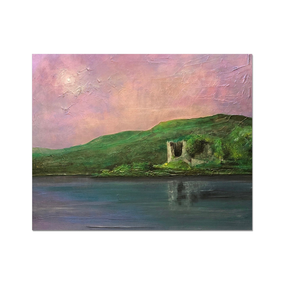 Acrylic painting of a ruined castle on a green hillside by a water under a pink sky