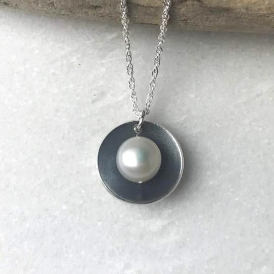 Silver Oyster Necklace with lustrous white pearl pendant