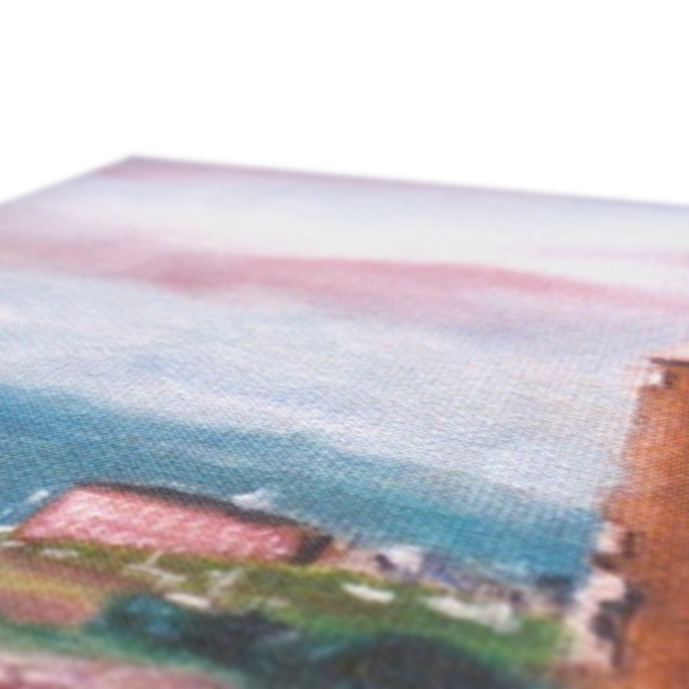 Pastel beach towel with seaside houses and ocean design