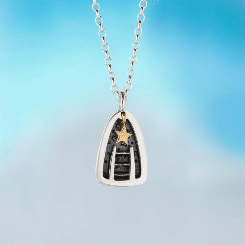 Reach for the Stars silver pendant necklace with black and gold star design by Alan Ardiff Jewellery