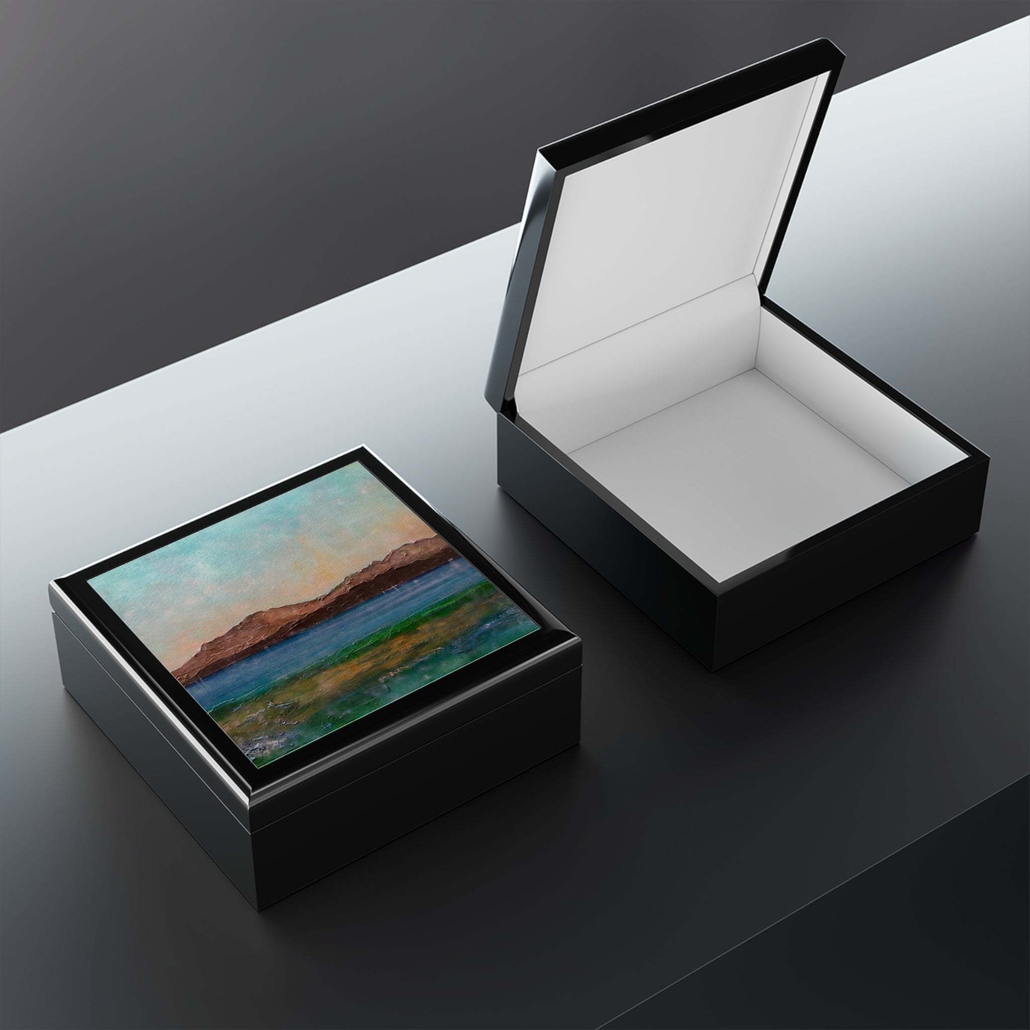 Glossy black Scalpsie Bay jewelry box with teal landscape painting